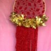 red & golden decorative hanging